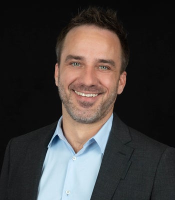 Portrait of Ayden Gramm, Associate Broker.